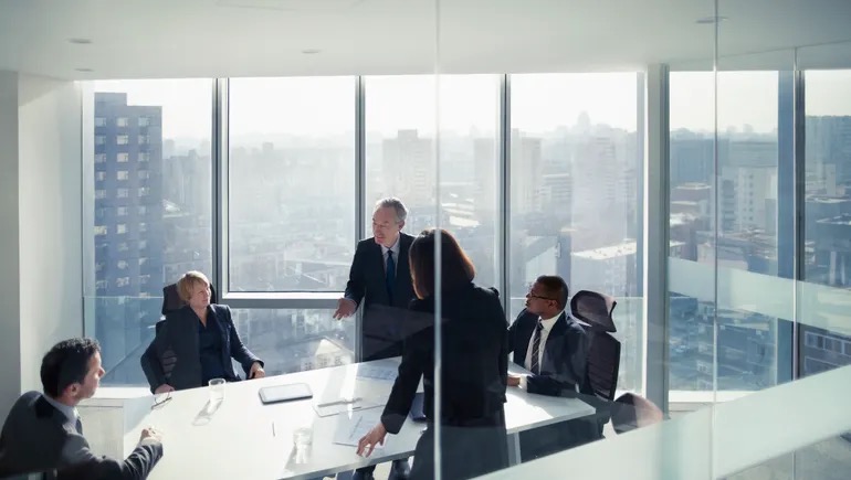 Tech professionals in a modern office hiring environment