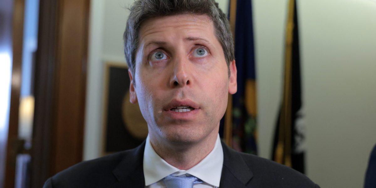 OpenAI CEO Sam Altman speaking to reporters